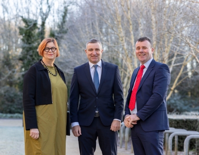 A picture of UL President Professor Kerstin Mey with Minister Niall Collins and HR Director Bobby O'Connor on the UL campus