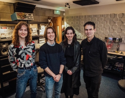 Three students and their lecturer in University of Limerick Electronic Music Studio