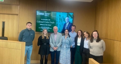 A group of students with Colonel Colm Doyle