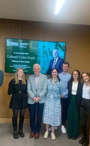 A group of students with Colonel Colm Doyle