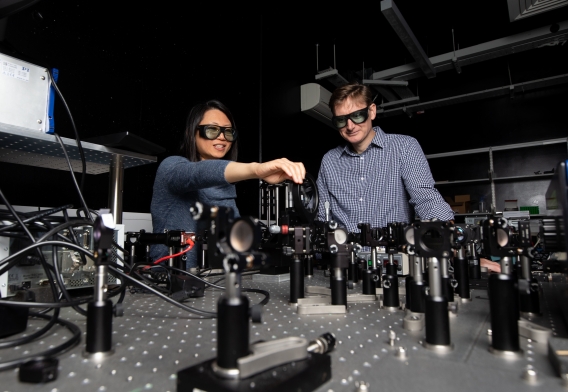 Professor Ning and Christophe working on a photonics project