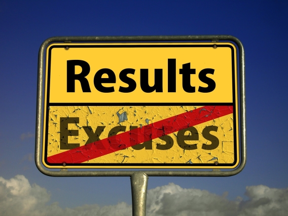 results vs excuses road sign