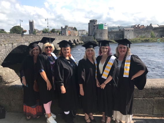 CWELL programme graduates pose in front of St John's castle, Limerick