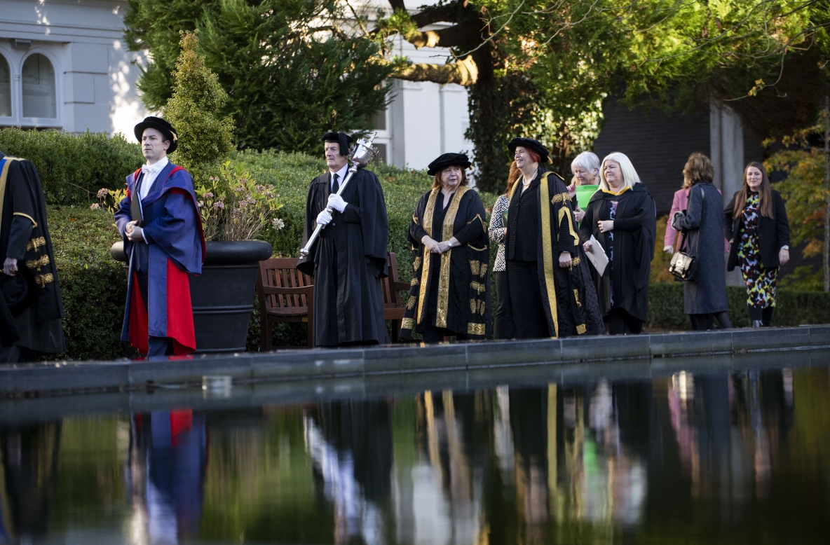 Staff and invited guests marching in procession through the University of Limerick campus 