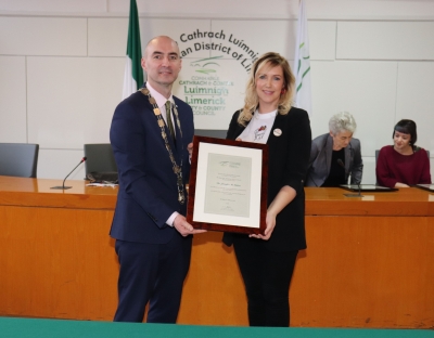 Metropolitan Mayor of Limerick Cllr Daniel Butler presenting Dr McMahon with her award in recognition of her work in community & mental health. 