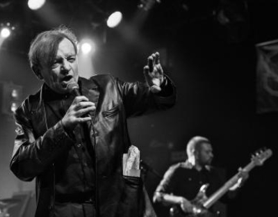 Mark E Smith playing in concert