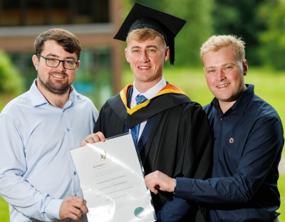 Tiarnan pictured with his brothers following his conferring ceremony 