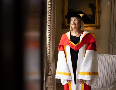 A picture of UL alumnus Brigid Laffan in her ceremonial robes