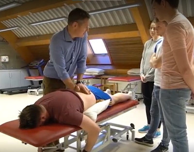 photo of someone demonstrating physiotherapy on a person