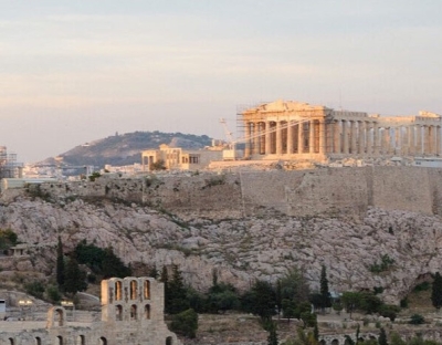 view of the skyline of athens focusing on the acropolis