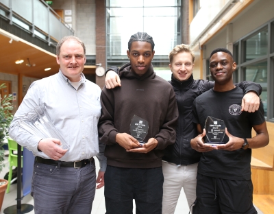 ICT Learning Centre Director Clem O’Donnell with National Robocode champions Lewis Ubebe, Maksims Gerkis and Nathan Ndlovu