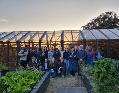 A group of students and faculty gathered at UL's rooftop garden