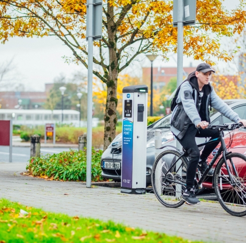 cyclist and electric charging points