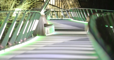 UL Living bridge lit up at night time