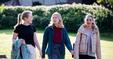 three students walking together