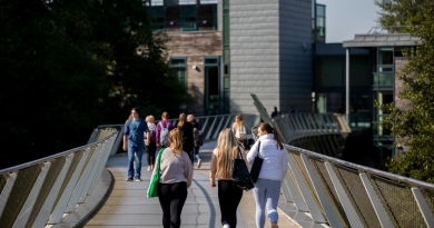 Clusters of students crossing the UL Living Bridge