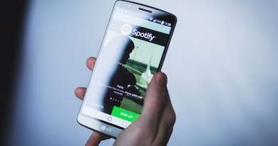 Image shows phone with spotify open