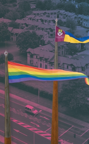 Pride flag and UL flag on UL flagpoles