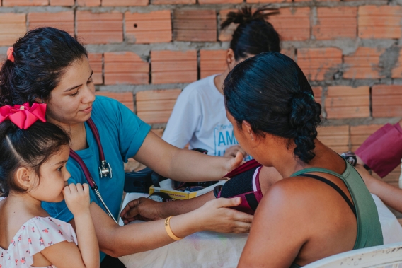 Female Nurse checking a woman's blood pressure. Photo by Carlos Magno on Unsplash
