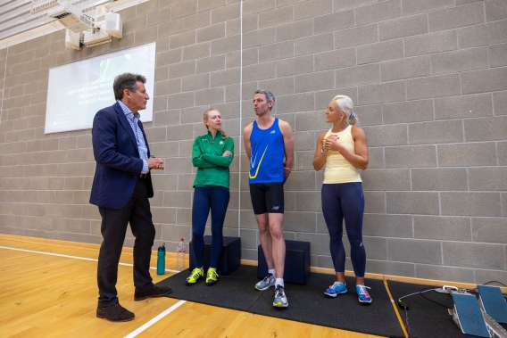 Seb Coe with athletes at the new research centre