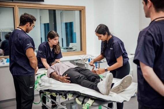 A picture of student medics working in the simulation lab