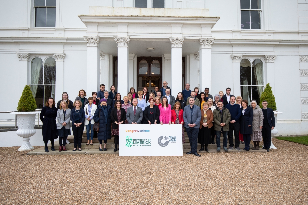 The full Athena Swan group pictured outside Plassey House at UL