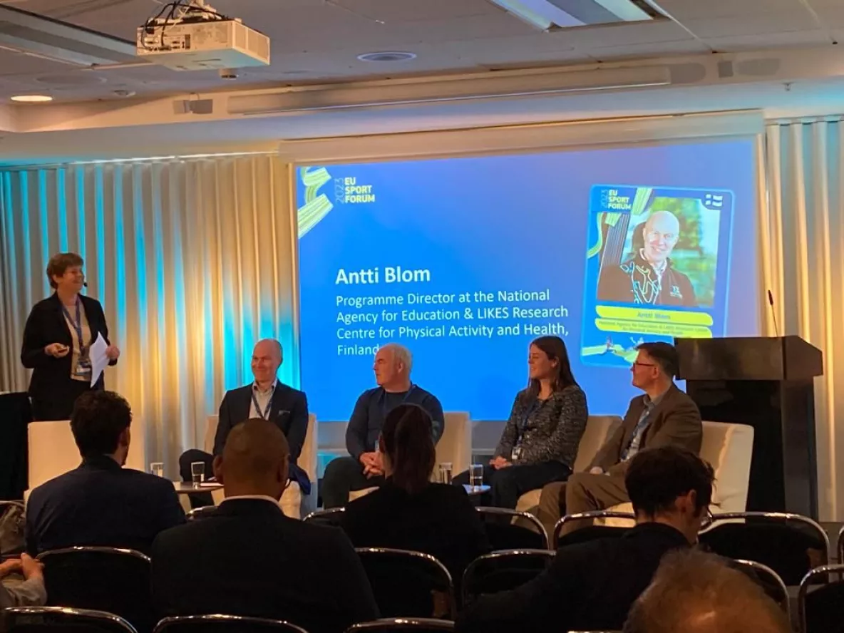 Attendees on stage at the event