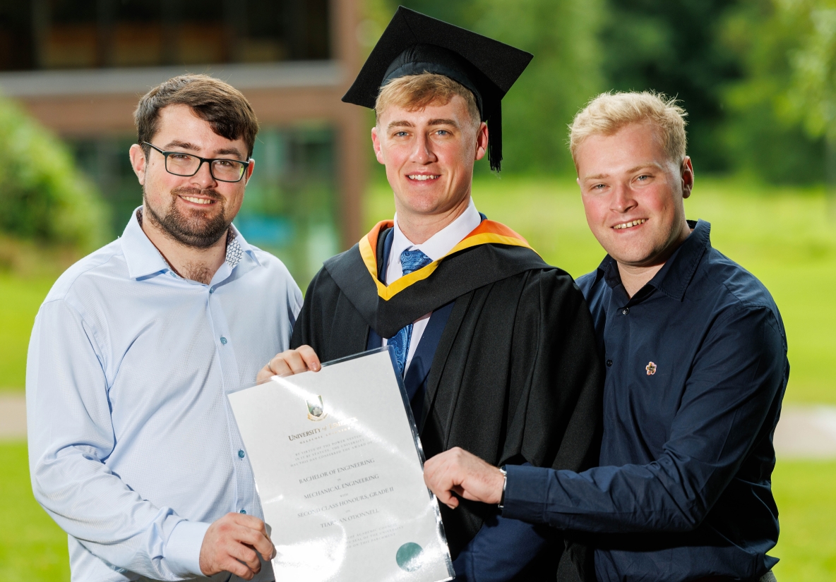 Tiarnan pictured with his brothers following his conferring ceremony 