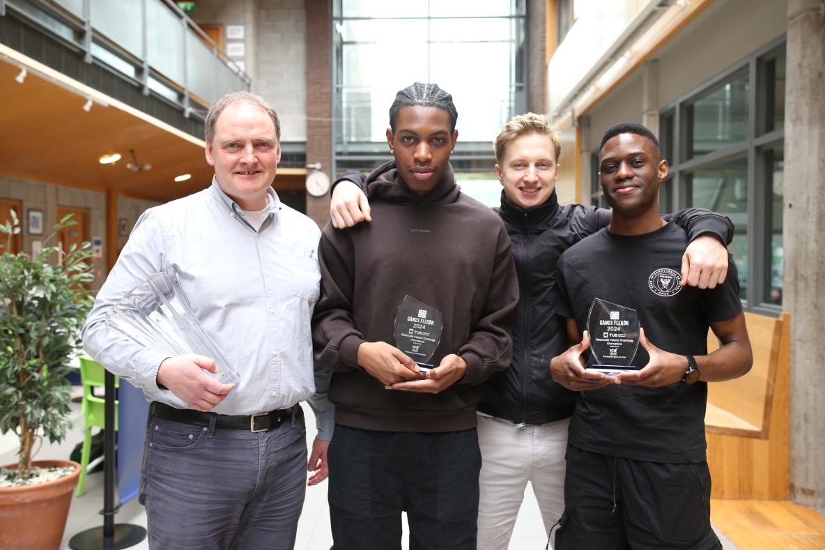 ICT Learning Centre Director Clem O’Donnell with National Robocode champions Lewis Ubebe, Maksims Gerkis and Nathan Ndlovu