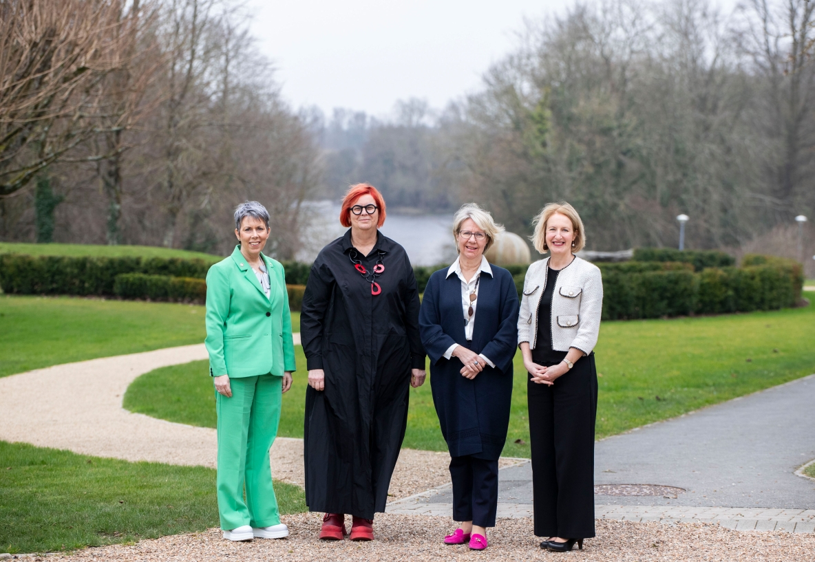 A picture of four female university presidents on the UL campus with the river Shannon as a backdrop