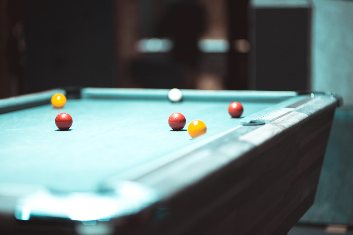 Image shows a pool table 