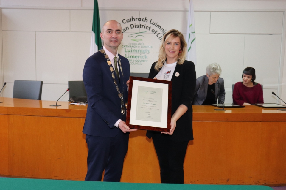 Metropolitan Mayor of Limerick Cllr Daniel Butler presenting Dr McMahon with her award in recognition of her work in community & mental health. 